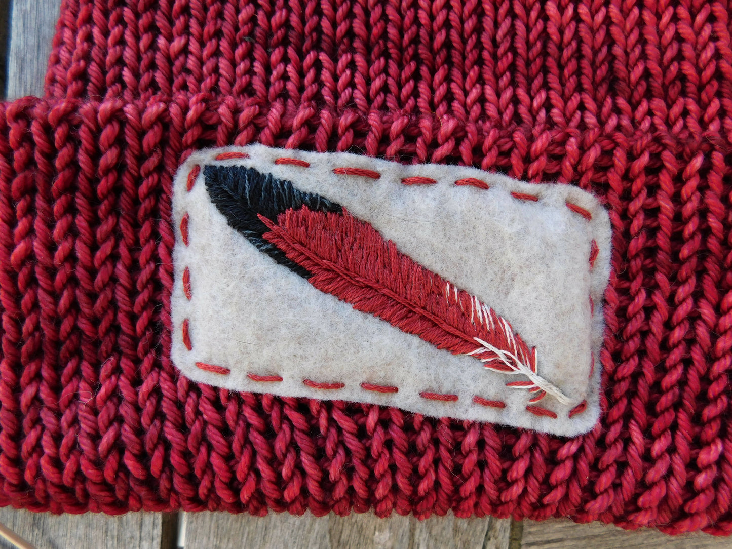 Hand Knit Beanie Featuring a red-shafted Northern Flicker
